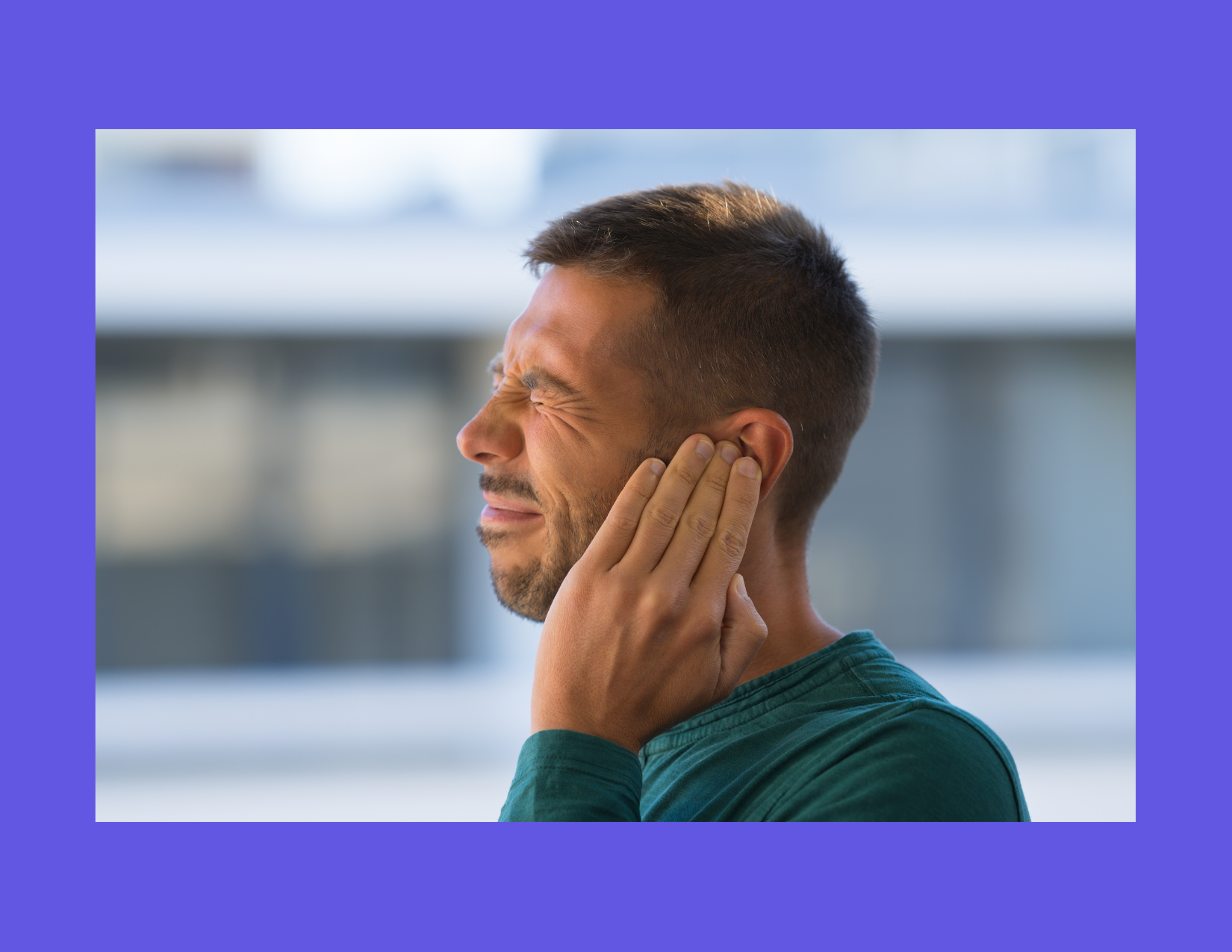 "Image of a person holding their ear in pain, representing symptoms of earache caused by TMJ disorder and referred pain. TMJ can lead to ear discomfort, jaw tension, and other related symptoms."